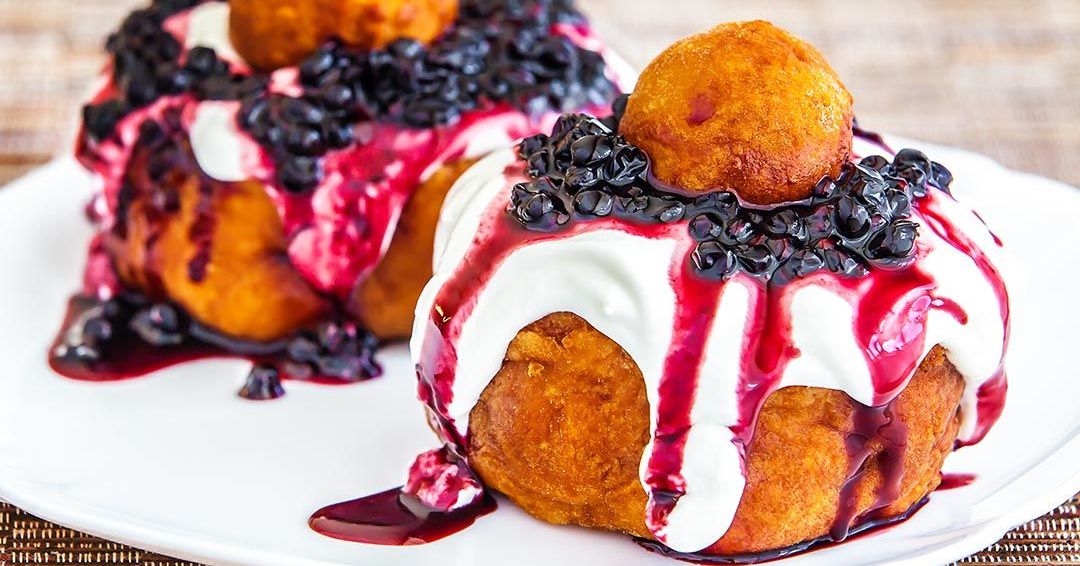papanasi - Fried or boiled cheese doughnuts - romanian traditional desert
